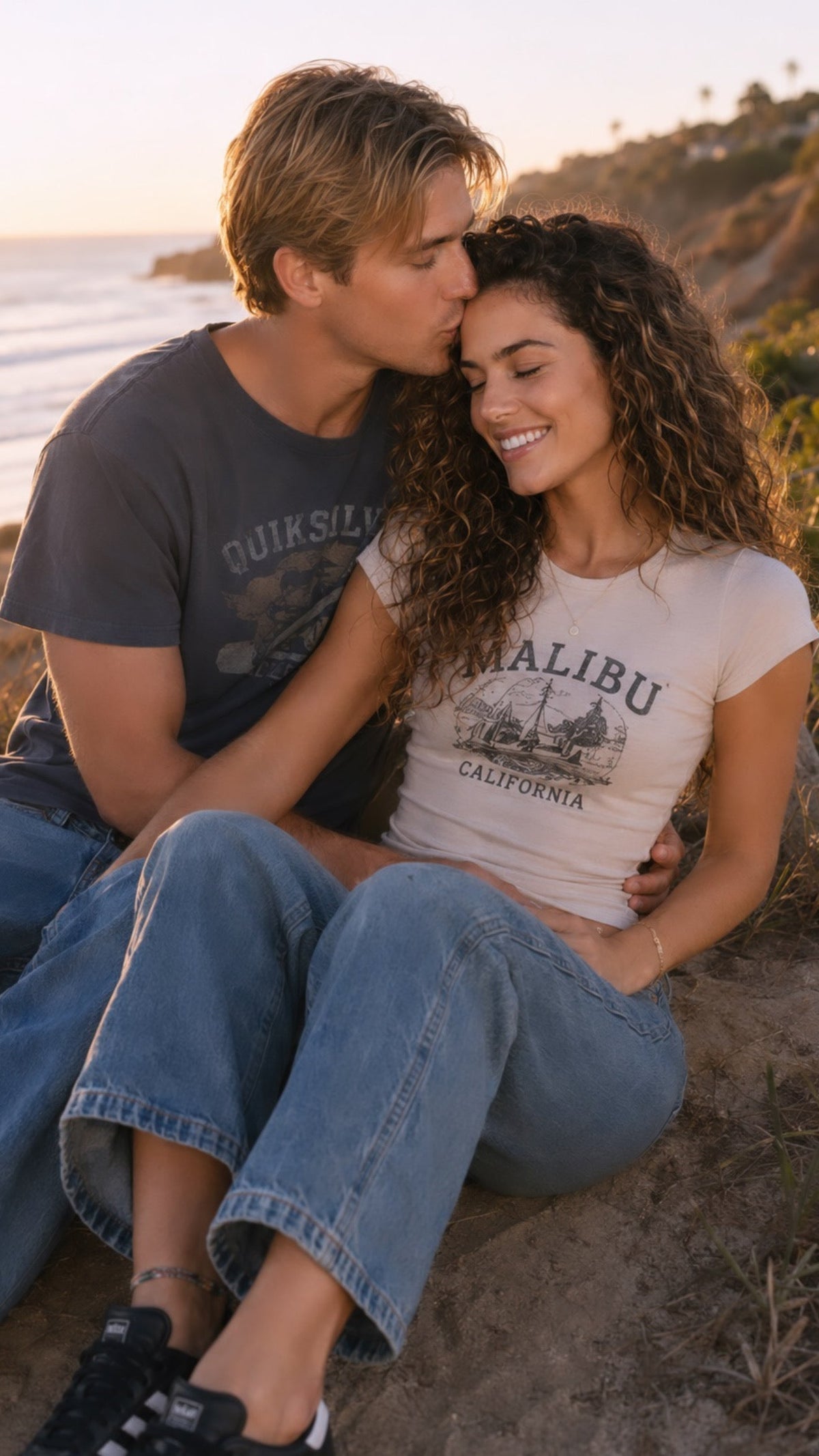 Tommy and Laurie Gianelli sharing a quiet moment on the Malibu coastline at sunset, symbolizing enduring love, connection, grief, and the themes of Quantum Entanglement.